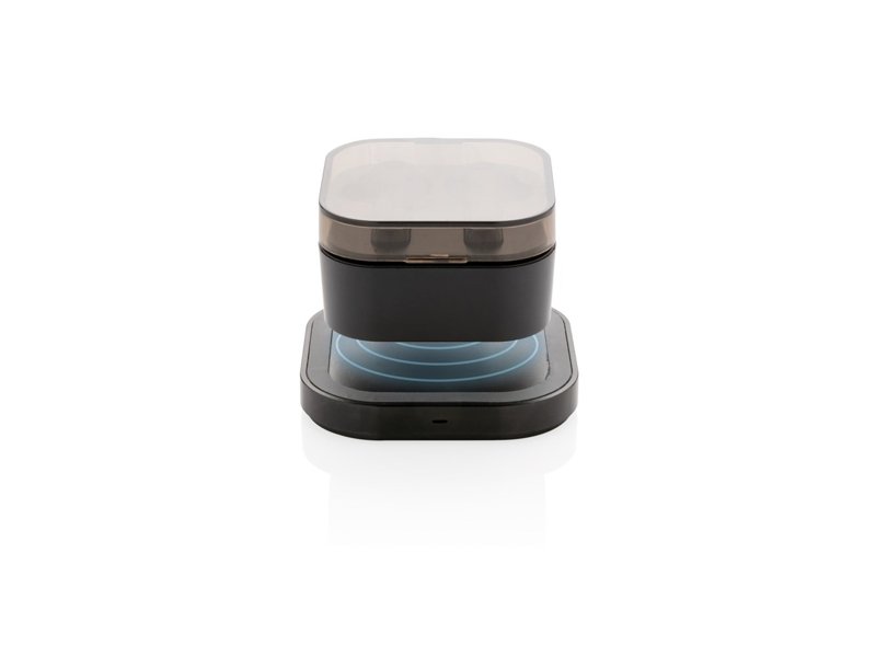 TWS oordoppen in oplaadcassette en draadloze oplader