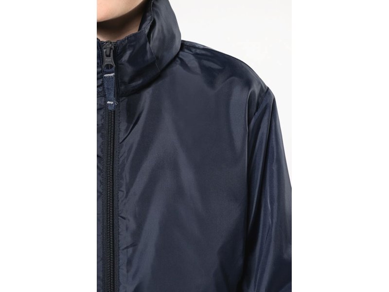Kariban Windbreaker, voordelige kinderjas geschikt voor bedrukken met logo en/of reclame
